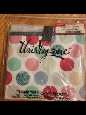 Thirty -One Out And About Changing Pad. Polka Dot Pop